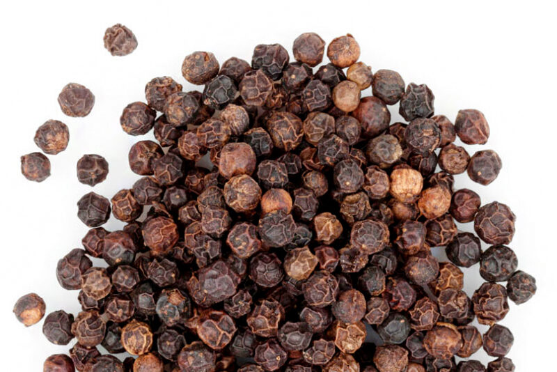 Black peppercorn. Isolated on white background